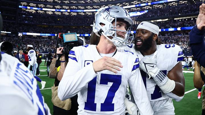 Dallas Cowboys defensive tackle Osa Odighizuwa (97) congratulates kicker Brandon Aubrey (17) after the game against the Philadelphia Eagles at AT&T Stadium. Dallas Cowboys defensive tackle Osa Odighizuwa (97) congratulates kicker Brandon Aubrey (17) after the game against the Philadelphia Eagles at AT&T Stadium.