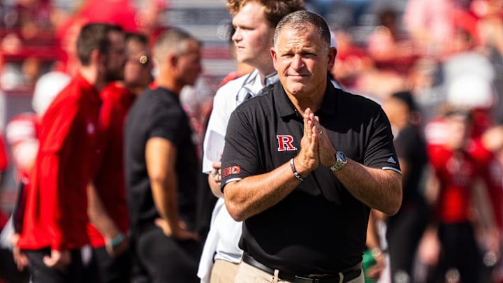 Oct 5, 2024; Lincoln, Nebraska, USA; Rutgers Scarlet Knights head coach Greg Schiano looks on during warmups before a game against the Nebraska Cornhuskers at Memorial Stadium. Mandatory Credit: Dylan Widger-Imagn Images