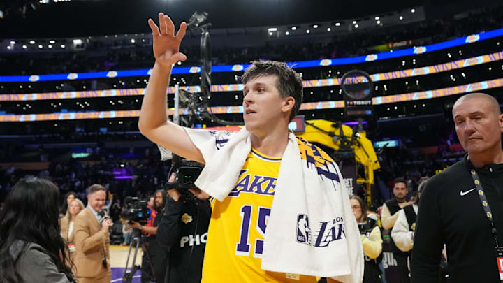 Feb 20, 2026; Los Angeles, California, USA; Los Angeles Lakers guard Austin Reaves (15) is escorted by John Stirn after the game against the LA Clippers at Crypto.com Arena. Mandatory Credit: Kirby Lee-Imagn Images Feb 20, 2026; Los Angeles, California, USA; Los Angeles Lakers guard Austin Reaves (15) is escorted by John Stirn after the game against the LA Clippers at Crypto.com Arena. Mandatory Credit: Kirby Lee-Imagn Images