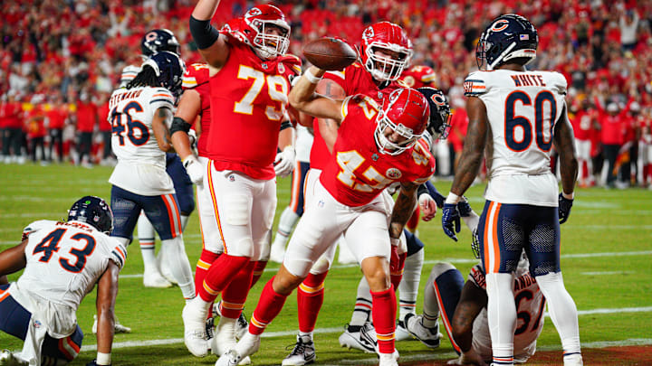 Aug 22, 2024; Kansas City, Missouri, USA; Kansas City Chiefs tight end Baylor Cupp (47) spikes the ball after scoring against the Chicago Bears during the second half at GEHA Field at Arrowhead Stadium. Mandatory Credit: Denny Medley-Imagn Images
