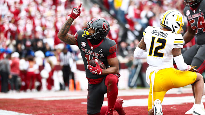 Oklahoma receiver Javonnie Gibson celebrates a touchdown catch against Missouri.