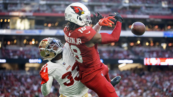 Jan 5, 2025; Glendale, Arizona, USA; San Francisco 49ers cornerback Rock Ya-Sin (33) breaks up a pass intended for Arizona Cardinals wide receiver Marvin Harrison Jr. (18) in the second half at State Farm Stadium. Mandatory Credit: Mark J. Rebilas-Imagn Images Jan 5, 2025; Glendale, Arizona, USA; San Francisco 49ers cornerback Rock Ya-Sin (33) breaks up a pass intended for Arizona Cardinals wide receiver Marvin Harrison Jr. (18) in the second half at State Farm Stadium. Mandatory Credit: Mark J. Rebilas-Imagn Images