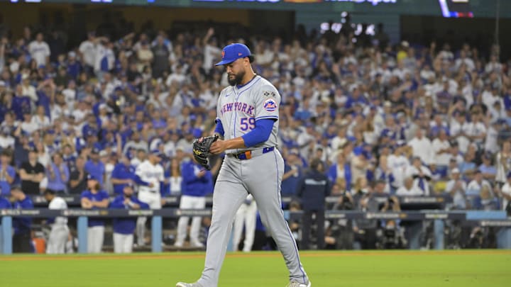 Oct 20, 2024; Los Angeles, California, USA; New York Mets pitcher Sean Manaea (59) walks to the dugout after being relieved in the third inning against the Los Angeles Dodgers during game six of the NLCS for the 2024 MLB playoffs at Dodger Stadium. Oct 20, 2024; Los Angeles, California, USA; New York Mets pitcher Sean Manaea (59) walks to the dugout after being relieved in the third inning against the Los Angeles Dodgers during game six of the NLCS for the 2024 MLB playoffs at Dodger Stadium.