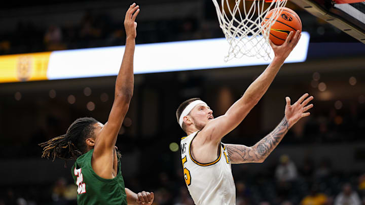Nov 14, 2024; Columbia, Missouri, USA; Missouri Tigers guard Jacob Crews (35) shoots the ball against Mississippi Valley State Delta Devils forward Darrion Salery (22) during the second half at Mizzou Arena. Mandatory Credit: Jay Biggerstaff-Imagn Images