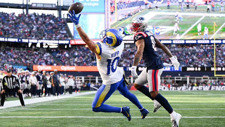 Nov 17, 2024; Foxborough, Massachusetts, USA; Los Angeles Rams wide receiver Cooper Kupp (10) is unable to complete a pass thrown by quarterback Matthew Stafford (not seen) during the first half of a game against the New England Patriots at Gillette Stadium. Mandatory Credit: Brian Fluharty-Imagn Images