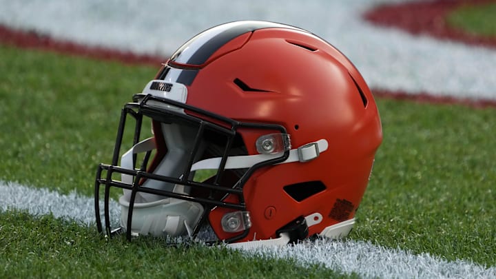 Aug 3, 2023; Canton, Ohio, USA; A Cleveland Browns helmet on the field at Tom Benson Hall of Fame Stadium.