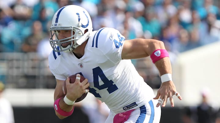 Indianapolis Colts tight end Dallas Clark (44) runs with the ball during the first half against the Jacksonville Jaguars at EverBank Field.