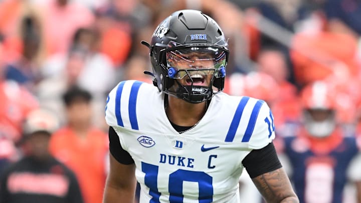 Sep 27, 2025; Syracuse, New York, USA; Duke Blue Devils quarterback Darian Mensah (10) calls a play in the first quarter against the Syracuse Orange at the JMA Wireless Dome. Mandatory Credit: Mark Konezny-Imagn Images Sep 27, 2025; Syracuse, New York, USA; Duke Blue Devils quarterback Darian Mensah (10) calls a play in the first quarter against the Syracuse Orange at the JMA Wireless Dome. Mandatory Credit: Mark Konezny-Imagn Images