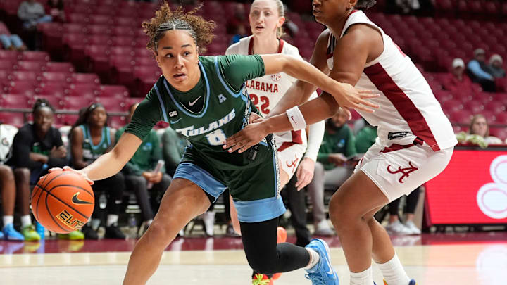 Dec 17, 2025; Tuscaloosa, AL, USA; Tulane guard Mecailin Marshall (8) grabs a loose ball in front of Alabama guard Jessica Timmons (23) at Coleman Coliseum. Mandatory Credit: Gary Cosby Jr.-Tuscaloosa News
