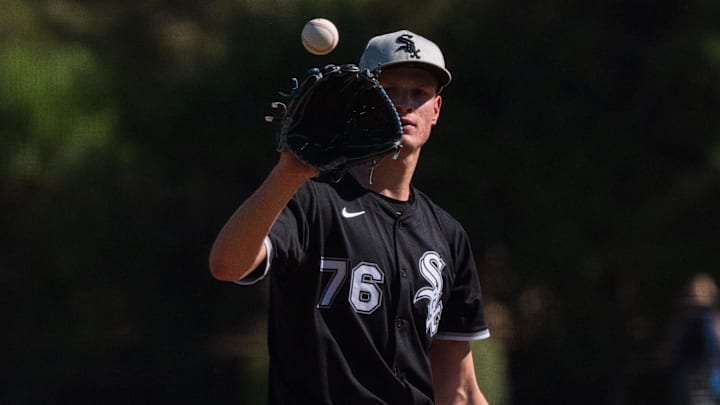 Chicago White Sox pitcher Noah Schultz (76) throws in spring training game against the San Diego Padres at Camelback Ranch. 