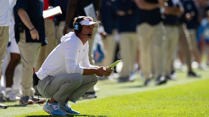 Nov 23, 2024; Gainesville, Florida, USA; Mississippi Rebels head coach Lane Kiffin looks on against the Florida Gators during the first half at Ben Hill Griffin Stadium. Mandatory Credit: Matt Pendleton-Imagn Images Nov 23, 2024; Gainesville, Florida, USA; Mississippi Rebels head coach Lane Kiffin looks on against the Florida Gators during the first half at Ben Hill Griffin Stadium. Mandatory Credit: Matt Pendleton-Imagn Images