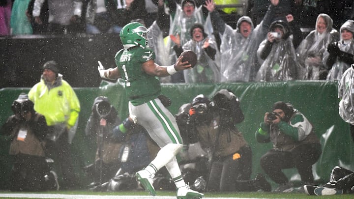 Philadelphia Eagles quarterback Jalen Hurts (1) scores the game-winning touchdown on a 12-yard run in overtime against the Buffalo Bills at Lincoln Financial Field.