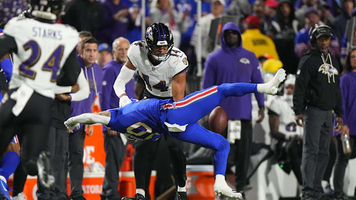 Sep 7, 2025; Orchard Park, New York, USA; Baltimore Ravens safety Kyle Hamilton (14) tackles Buffalo Bills wide receiver Khalil Shakir (10) during the fourth quarter at Highmark Stadium. Mandatory Credit: Gregory Fisher-Imagn Images Sep 7, 2025; Orchard Park, New York, USA; Baltimore Ravens safety Kyle Hamilton (14) tackles Buffalo Bills wide receiver Khalil Shakir (10) during the fourth quarter at Highmark Stadium. Mandatory Credit: Gregory Fisher-Imagn Images