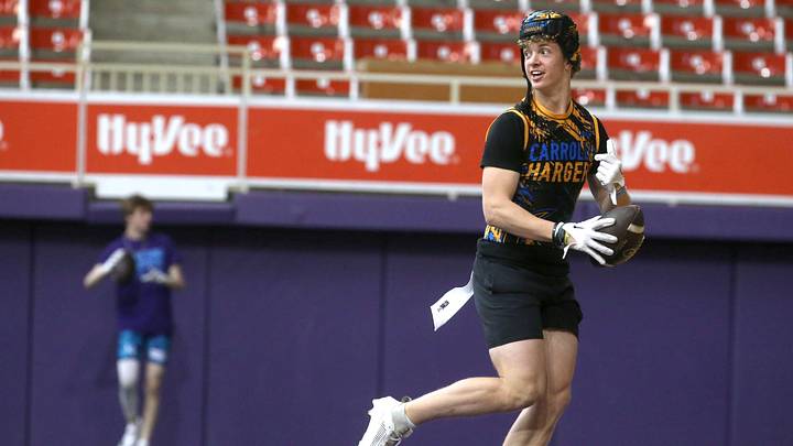 The Carroll Chargers’ Jaxx DeJean warms up before a 7-on-7 football tournament game Saturday, April 13, 2024 at the UNI Dome in Cedar Falls, Iowa. The Carroll Chargers’ Jaxx DeJean warms up before a 7-on-7 football tournament game Saturday, April 13, 2024 at the UNI Dome in Cedar Falls, Iowa.