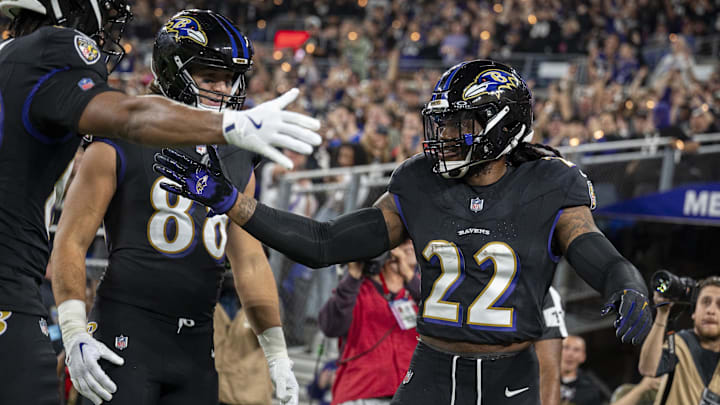 Sep 29, 2024; Baltimore, Maryland, USA;  Baltimore Ravens running back Derrick Henry (22) celebrates with teammates after scoring during the second quarter against the Buffalo Bills at M&T Bank Stadium. Mandatory Credit: Tommy Gilligan-Imagn Images