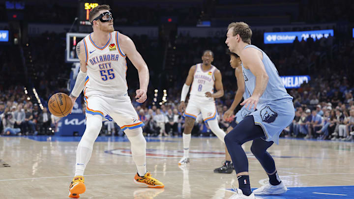 Mar 27, 2025; Oklahoma City, Oklahoma, USA; Oklahoma City Thunder center Isaiah Hartenstein (55) looks to pass against the Memphis Grizzlies during the second quarter at Paycom Center. Mandatory Credit: Alonzo Adams-Imagn Images