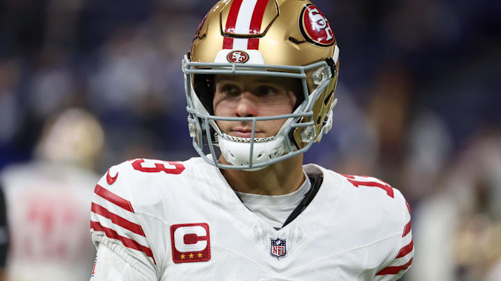 Dec 22, 2025; Indianapolis, Indiana, USA; San Francisco 49ers quarterback Brock Purdy (13) looks on during warmups before the game against the Indianapolis Colts at Lucas Oil Stadium