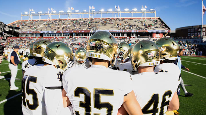 Nov 1, 2025; Chestnut Hill, Massachusetts, USA; Notre Dame Fighting Irish players players huddle before the game against the Boston College Eagles at Alumni Stadium. 