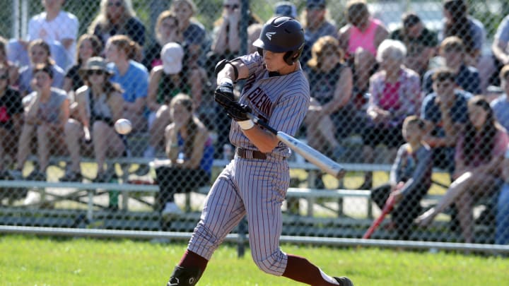 Colt Emerson, of John Glenn, takes a swing during a Division II sectional final against host Morgan on May 17, 2022, in McConnelsville. Colt Emerson, of John Glenn, takes a swing during a Division II sectional final against host Morgan on May 17, 2022, in McConnelsville.