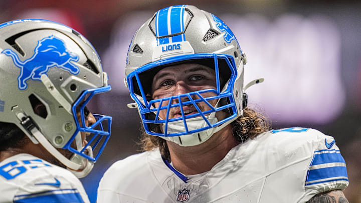 Aug 8, 2025; Atlanta, Georgia, USA; Detroit Lions offensive tackle Tate Ratledge (69) shown on the field prior to the game against the Atlanta Falcons at Mercedes-Benz Stadium. Mandatory Credit: Dale Zanine-Imagn Images