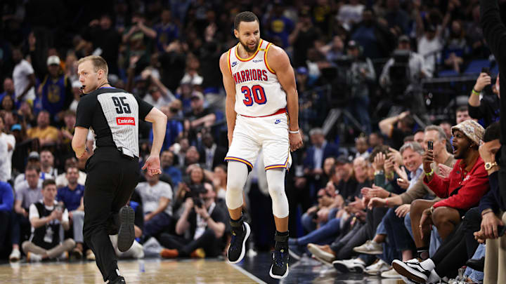 Golden State Warriors guard Stephen Curry (30) celebrates after a basket against the Orlando Magic in the fourth quarter at Kia Center. 