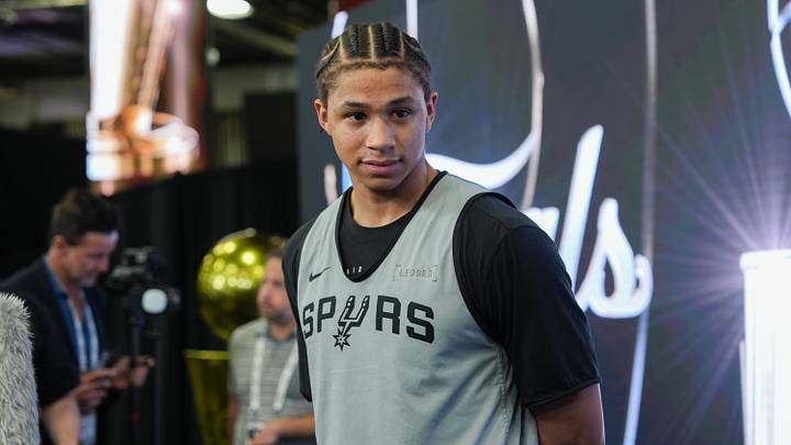 Jun 2, 2026; San Antonio, TX, USA;  San Antonio Spurs forward Carter Bryant (11) talks to the press during media day for the 2026 NBA Finals at Frost Bank Center. Mandatory Credit: Daniel Dunn-Imagn Images