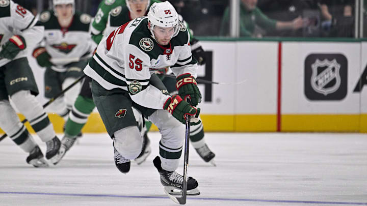 Sep 23, 2025; Dallas, Texas, USA; Minnesota Wild defenseman David Jiricek (55) in action during the game between the Dallas Stars and the Minnesota Wild at American Airlines Center. 