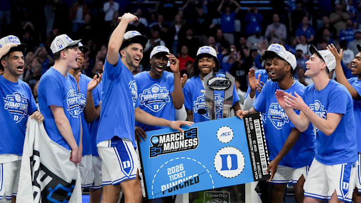 Mar 14, 2026; Charlotte, NC, USA; The Duke Blue Devils celebrate after defeating the Virginia Cavaliers in the men's ACC Conference Tournament Championship at Spectrum Center. Mandatory Credit: Bob Donnan-Imagn Images