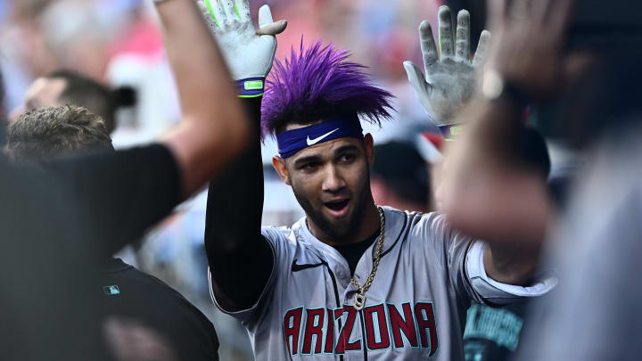Jun 21, 2024; Philadelphia, Pennsylvania, USA; Arizona Diamondbacks outfielder Lourdes Gurriel Jr (12) celebrates with teammates after hitting a home run against the Philadelphia Phillies in the second inning at Citizens Bank Park. Mandatory Credit: Kyle Ross-USA TODAY Sports
