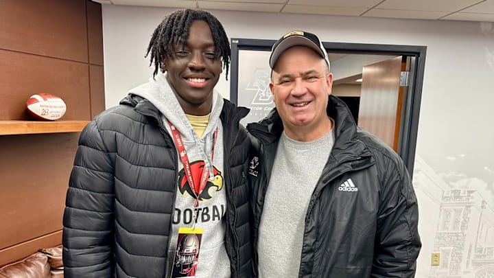 2026 QB Femi Babalola alongside Boston College head coach Bill O'Brien