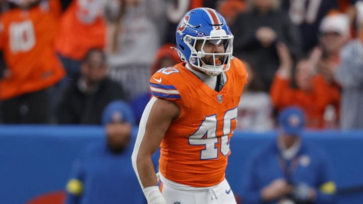 Jan 4, 2026; Denver, Colorado, USA; Denver Broncos linebacker Justin Strnad (40) celebrates after a sack during the second half against the Los Angeles Chargers at Empower Field at Mile High. Mandatory Credit: Isaiah J. Downing-Imagn Images