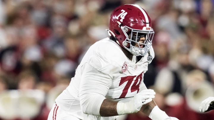 Dec 19, 2025; Norman, OK, USA; Alabama Crimson Tide offensive lineman Kadyn Proctor (74) against the Oklahoma Sooners during the CFP National Playoff First Round at Gaylord Family Oklahoma Memorial Stadium. Mandatory Credit: Mark J. Rebilas-Imagn Images