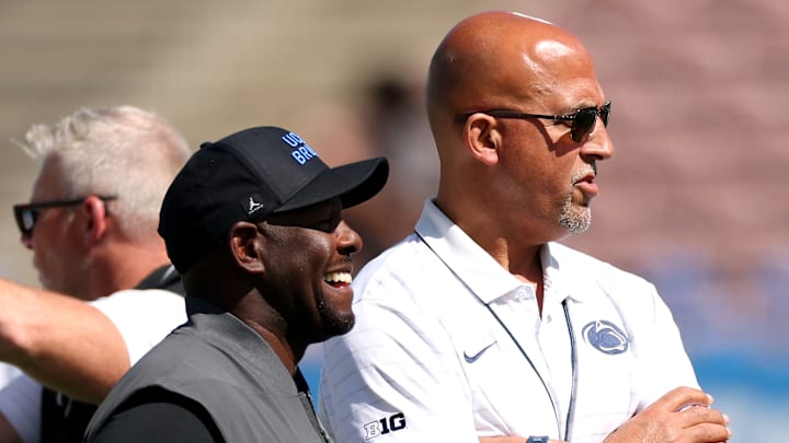 Penn State head coach James Franklin with UCLA interim head coach Tim Skipper