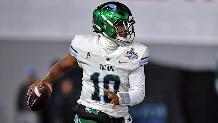 Dec 6, 2024; West Point, NY, USA; Tulane Green Wave quarterback Darian Mensah (10) looks to pass against the Army Black Knights during the second half at Michie Stadium. Mandatory Credit: Danny Wild-Imagn Images