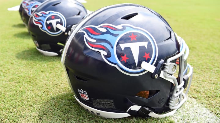 Jul 29, 2023; Nashville, TN, USA; View of helmets on the field as Tennessee Titans players finish training camp practice. Mandatory Credit: Christopher Hanewinckel-USA TODAY Sports