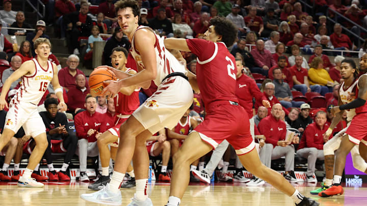 Nov 18, 2024; Ames, Iowa, USA; IUPUI Jaguars forward DeSean Goode (2) defends Iowa State Cyclones forward Milan Momcilovic (22) at James H. Hilton Coliseum. Mandatory Credit: Reese Strickland-Imagn Images Nov 18, 2024; Ames, Iowa, USA; IUPUI Jaguars forward DeSean Goode (2) defends Iowa State Cyclones forward Milan Momcilovic (22) at James H. Hilton Coliseum. Mandatory Credit: Reese Strickland-Imagn Images
