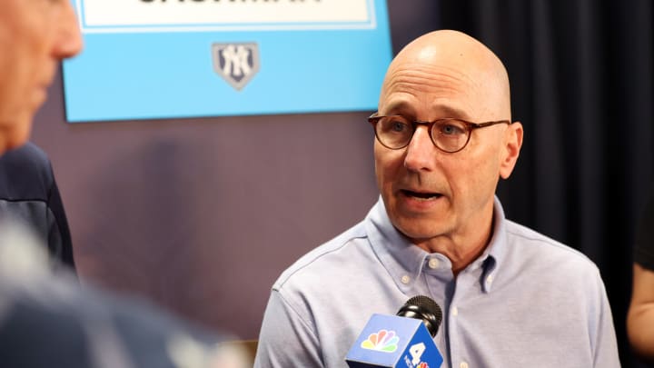 Feb 15, 2024; Tampa, FL, USA; New York Yankees general manager Brian Cashman talks with media at George M. Steinbrenner Field. Mandatory Credit: Kim Klement Neitzel-USA TODAY Sports