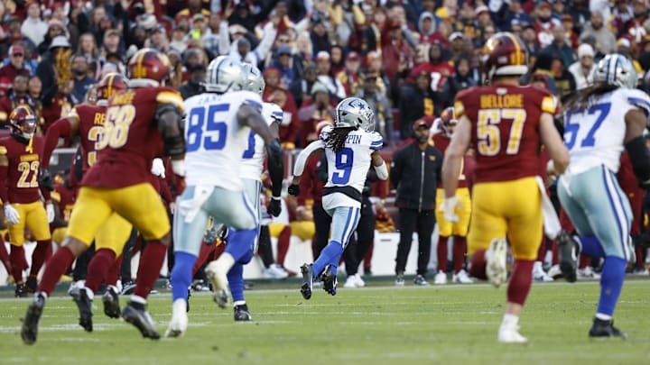 Dallas Cowboys wide receiver KaVontae Turpin returns a kickoff for a touchdown against the Washington Commanders during the fourth quarter at Northwest Stadium. 