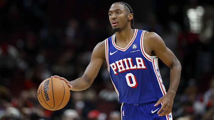 Dec 8, 2024; Chicago, Illinois, USA; Philadelphia 76ers guard Tyrese Maxey (0) brings the ball up court against the Chicago Bulls during the second half at United Center. Mandatory Credit: Kamil Krzaczynski-Imagn Images