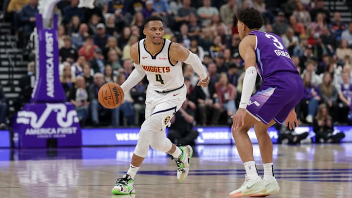 Dec 30, 2024; Salt Lake City, Utah, USA; Denver Nuggets guard Russell Westbrook (4) controls the ball while guarded by Utah Jazz guard Keyonte George (3) during the second quarter at Delta Center. Mandatory Credit: Chris Nicoll-Imagn Images Dec 30, 2024; Salt Lake City, Utah, USA; Denver Nuggets guard Russell Westbrook (4) controls the ball while guarded by Utah Jazz guard Keyonte George (3) during the second quarter at Delta Center. Mandatory Credit: Chris Nicoll-Imagn Images
