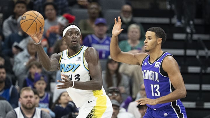 December 22, 2024; Sacramento, California, USA; Indiana Pacers forward Pascal Siakam (43) passes the basketball against Sacramento Kings forward Keegan Murray (13) during the first quarter at Golden 1 Center. Mandatory Credit: Kyle Terada-Imagn Images December 22, 2024; Sacramento, California, USA; Indiana Pacers forward Pascal Siakam (43) passes the basketball against Sacramento Kings forward Keegan Murray (13) during the first quarter at Golden 1 Center. Mandatory Credit: Kyle Terada-Imagn Images