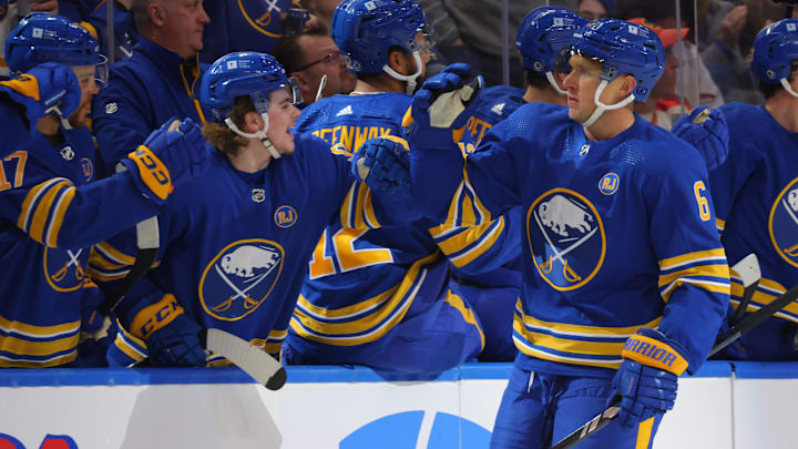Oct 19, 2023; Buffalo, New York, USA;  Buffalo Sabres defenseman Erik Johnson (6) celebrates his