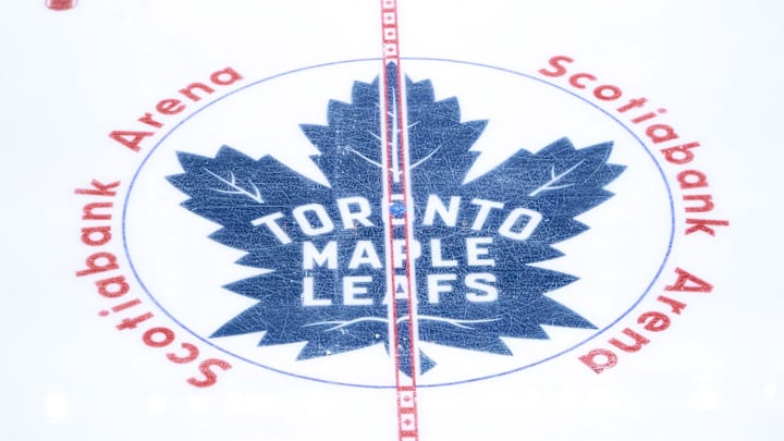Apr 20, 2025; Toronto, Ontario, CAN; The Toronto Maple Leafs logo at center ice before game one of the first round of the 2025 Stanley Cup Playoffs against the Ottawa Senators at Scotiabank Arena. Mandatory Credit: John E. Sokolowski-Imagn Images