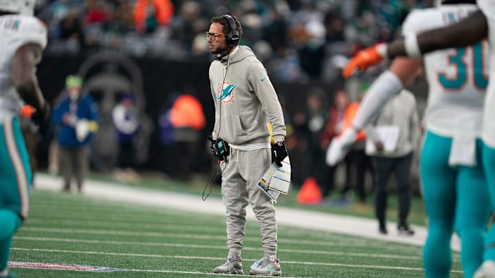 Miami Dolphin's head coach Mike McDaniel stands on the field during a week 14 football game between the New York Jets and Miami Dolphins at MetLife Stadium on Sunday, Dec. 7, 2025. Miami Dolphin's head coach Mike McDaniel stands on the field during a week 14 football game between the New York Jets and Miami Dolphins at MetLife Stadium on Sunday, Dec. 7, 2025.
