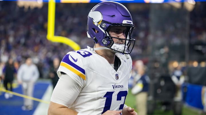 Jan 13, 2025; Glendale, AZ, USA; Minnesota Vikings quarterback Daniel Jones (13) against the Los Angeles Rams during an NFC wild card game at State Farm Stadium. Mandatory Credit: Mark J. Rebilas-Imagn Images