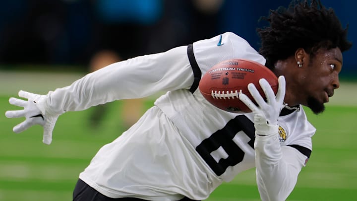 Jacksonville Jaguars safety Darnell Savage (6) falls to the turf after hauling in a reception during the second day of a mandatory minicamp Tuesday, June 11, 2024, at EverBank Stadium's Miller Electric Center in Jacksonville, Fla.
