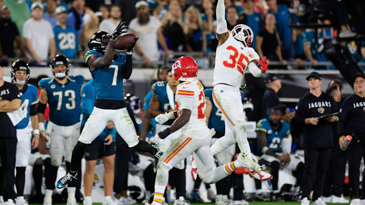 Jacksonville Jaguars wide receiver Brian Thomas Jr. (7) hauls in a reception against Kansas City Chiefs cornerback Jaylen Watson (35) during the fourth quarter of an NFL football matchup at EverBank Stadium, Monday, Oct. 6, 2025, in Jacksonville, Fla. The Jacksonville Jaguars edged the Kansas City Chiefs 31-28. [Corey Perrine/Florida Times-Union]