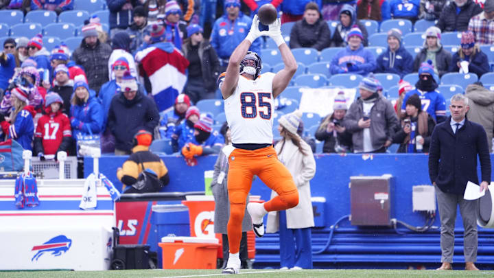 Jan 12, 2025; Orchard Park, New York, USA;  Denver Broncos tight end Lucas Krull (85) warms up before a game against the Buffalo Bills in an AFC wild card game at Highmark Stadium. Mandatory Credit: Gregory Fisher-Imagn Images