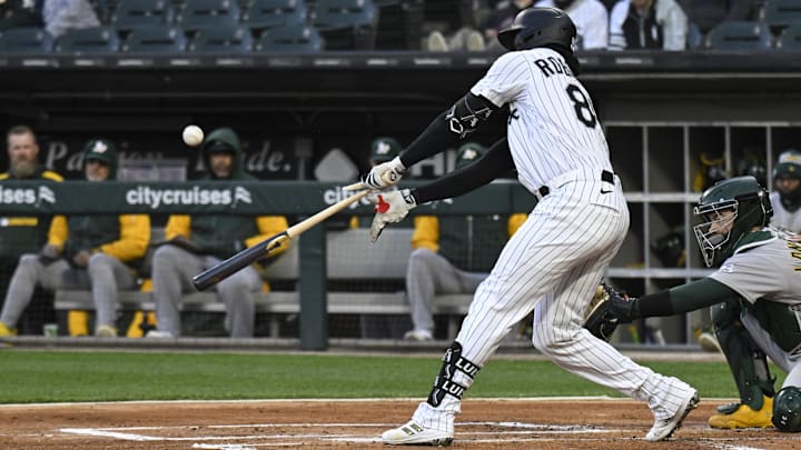 Chicago White Sox outfielder Luis Robert Jt. (88) breaks his bat against the Athletics at Rate Field. 