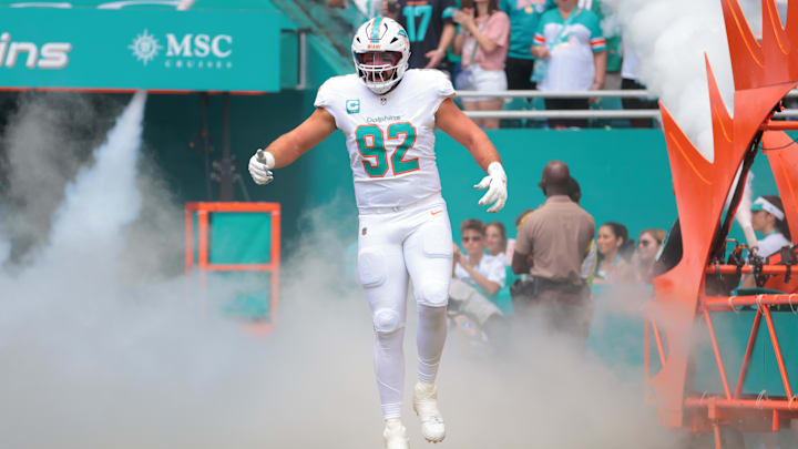 Miami Dolphins defensive tackle Zach Sieler (92) is introduced to the fan before the game against the New England Patriots at Hard Rock Stadium.